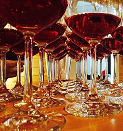 Close-up of wine glasses on table