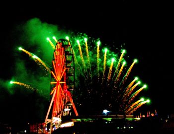 Firework display at night