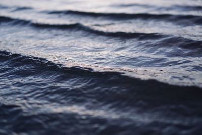 Close-up of waves rushing towards shore