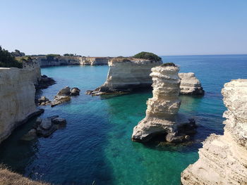 Scenic view of sea against blue sky