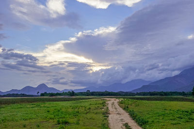 Country road passing through landscape