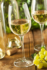 Close-up of wineglass on table