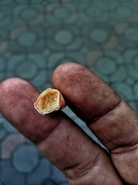 Close-up of man holding ice cream