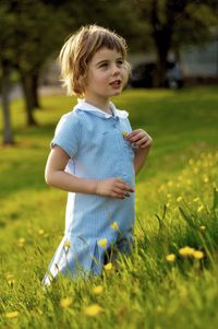 Girl standing on field