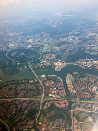 Aerial view of city buildings against sky