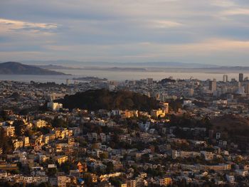 Aerial view of cityscape against sky