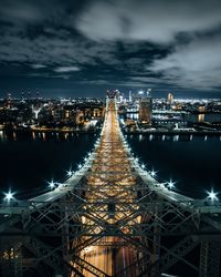 High angle view of illuminated city buildings at night