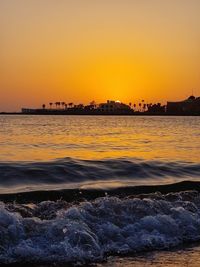 Scenic view of sea against sky during sunset