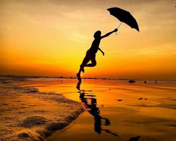 Silhouette of man on beach