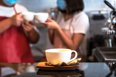 Coffee served on table at cafe