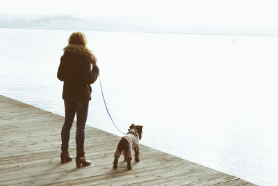 Woman walking the dog