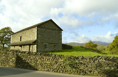 Ambleside traditional stone house at the north of lake windermere in cumbria