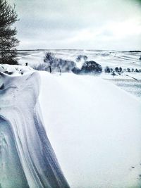 Scenic view of snow covered landscape