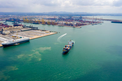 Aerial view container cargo ship in import export business service commercial trade logistic 