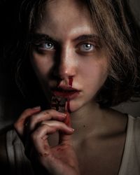 Close-up portrait of woman with eyes closed
