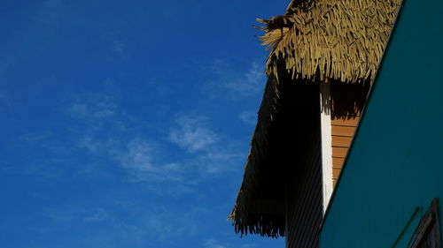 Low angle view of building against blue sky