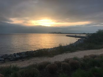 Scenic view of sea against sky during sunset