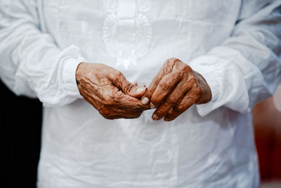 Close-up of hand holding food