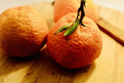 Close-up of oranges on table