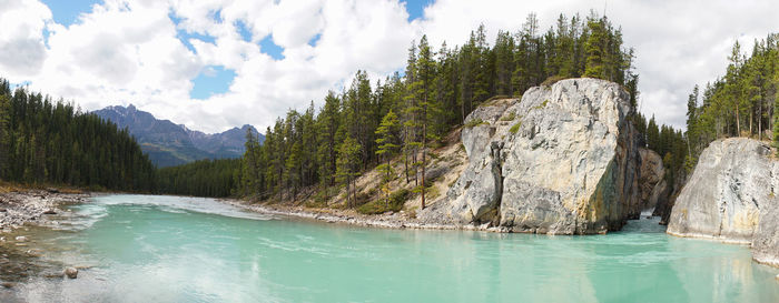 Panoramic view of rocks and mountains against sky