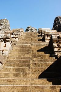 Low angle view of old ruins against clear sky