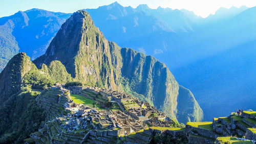 High angle view of machu picchu and surrounding mountains in peru