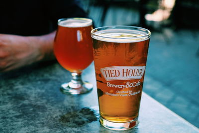 Close-up of beer glass on table