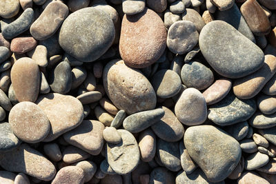 Sea stone on beach shore. horizontal image.