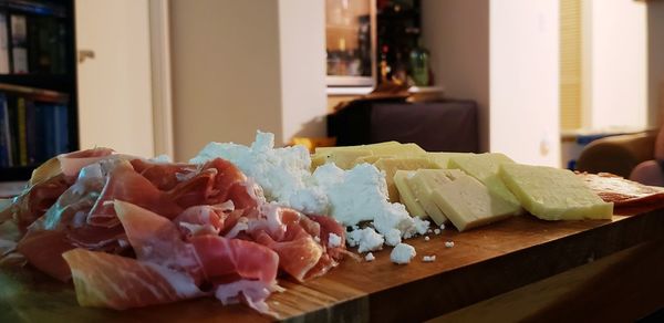 Close-up of chopped vegetables on table