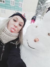 Portrait of smiling girl in snow