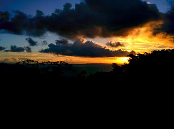 Scenic view of dramatic sky during sunset