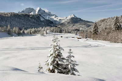 Scenic view of snowcapped mountains against sky