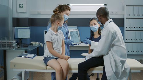 Female doctor working at clinic