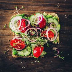 High angle view of fresh sandwich on serving board