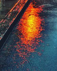 High angle view of illuminated road at night