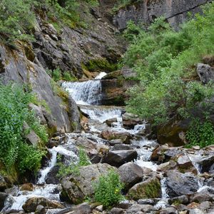 Scenic view of stream flowing through rocks