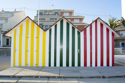 Built structure on beach against clear sky