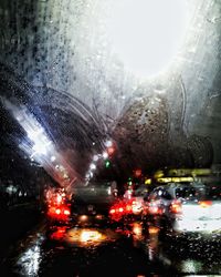 Cars on wet road in rainy season