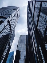 Low angle view of modern buildings against sky