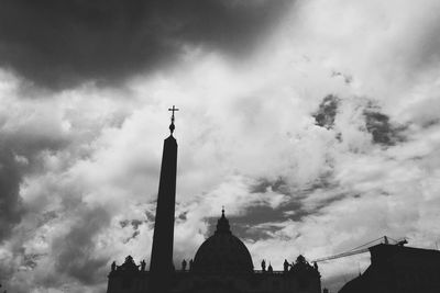 Low angle view of church against cloudy sky