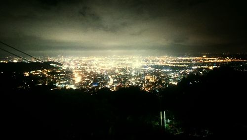 Illuminated cityscape at night