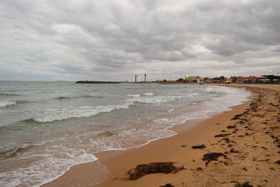 Scenic view of beach against sky