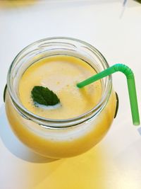 Close-up of drink in jar on table