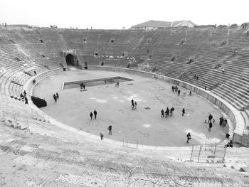 People on landscape against sky