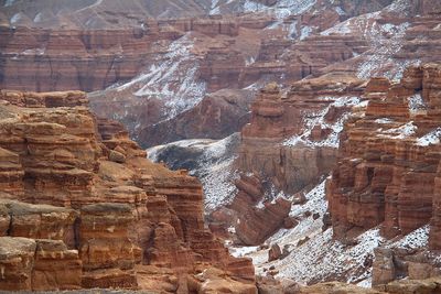 Charyn canyon in winter, figured walls of the canyon are covered with snow