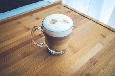 High angle view of coffee cup on table