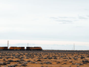 Scenic view of desert against sky