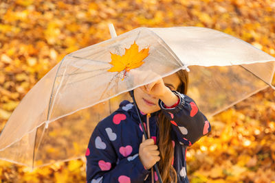 Portrait of woman with umbrella