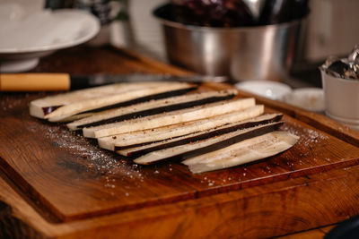 Seasoning eggplant for cooking. vegan food healthy concept vegetables