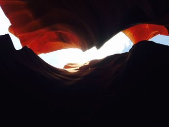 Low angle view of rock formation against sky